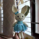 Handmade crochet bunny doll in blue dress amigurumi soft toy