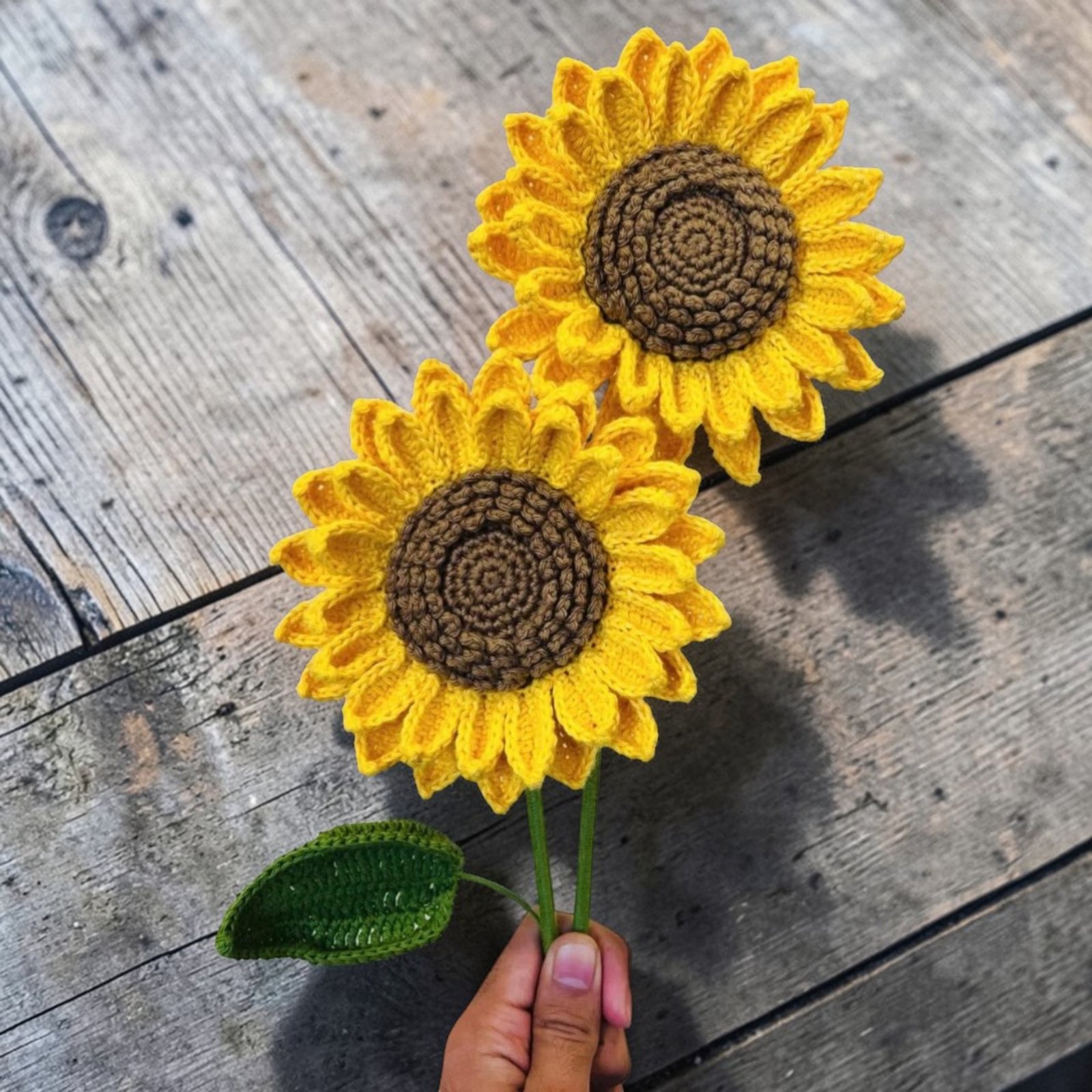 Handmade crochet sunflower flower decoration made with yellow yarn