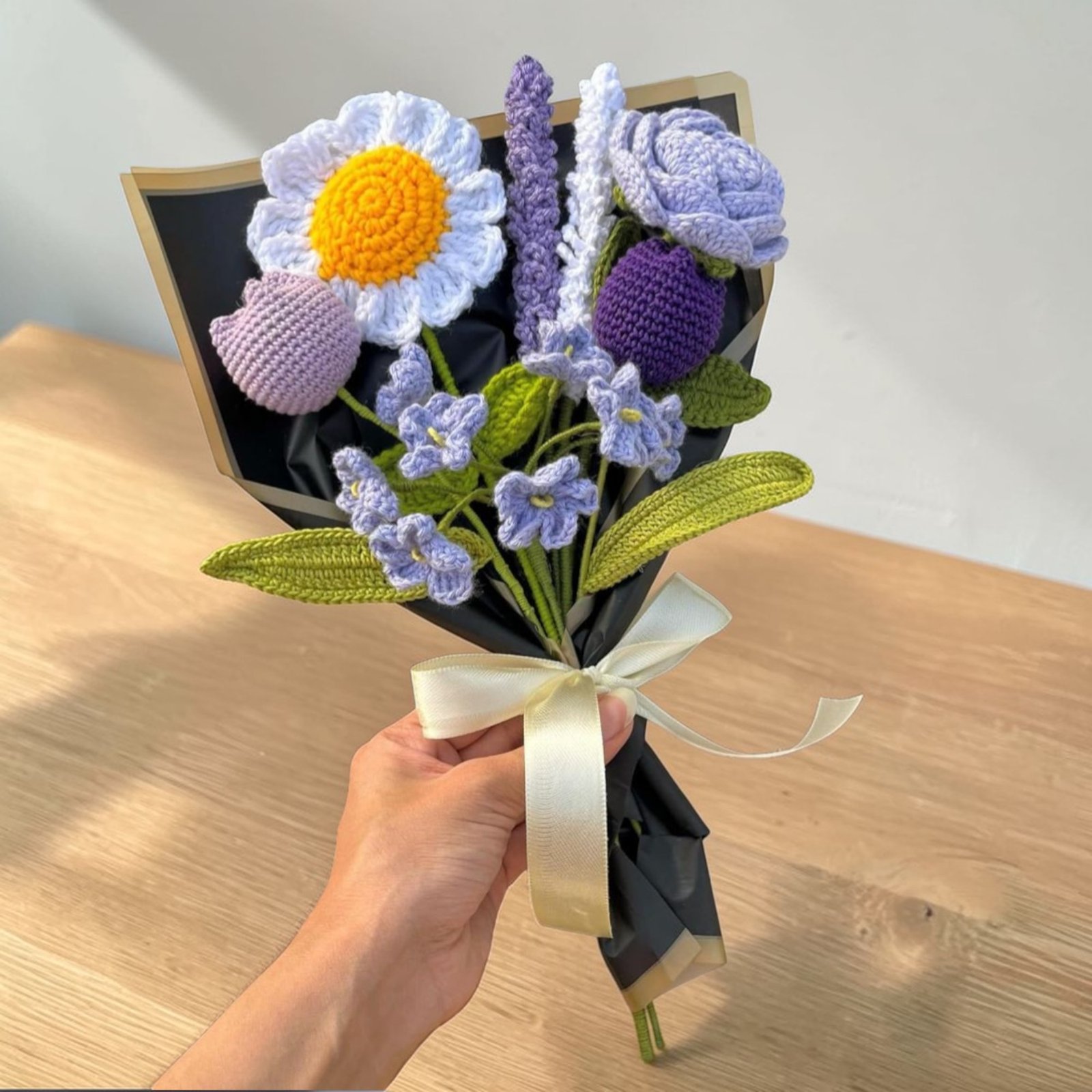 handmade crochet flower bouquet with daisy rose lavender flowers wrapped in black paper